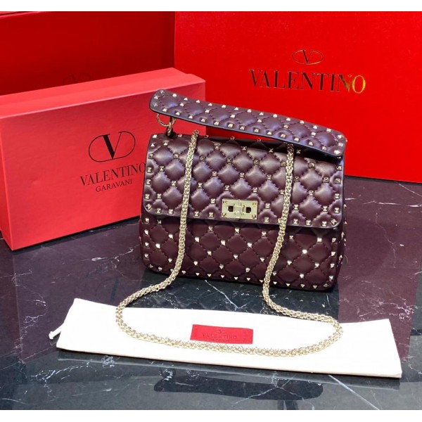 Valentino luxuries  gold dark red