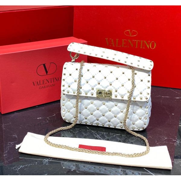 Valentino luxuries  gold white